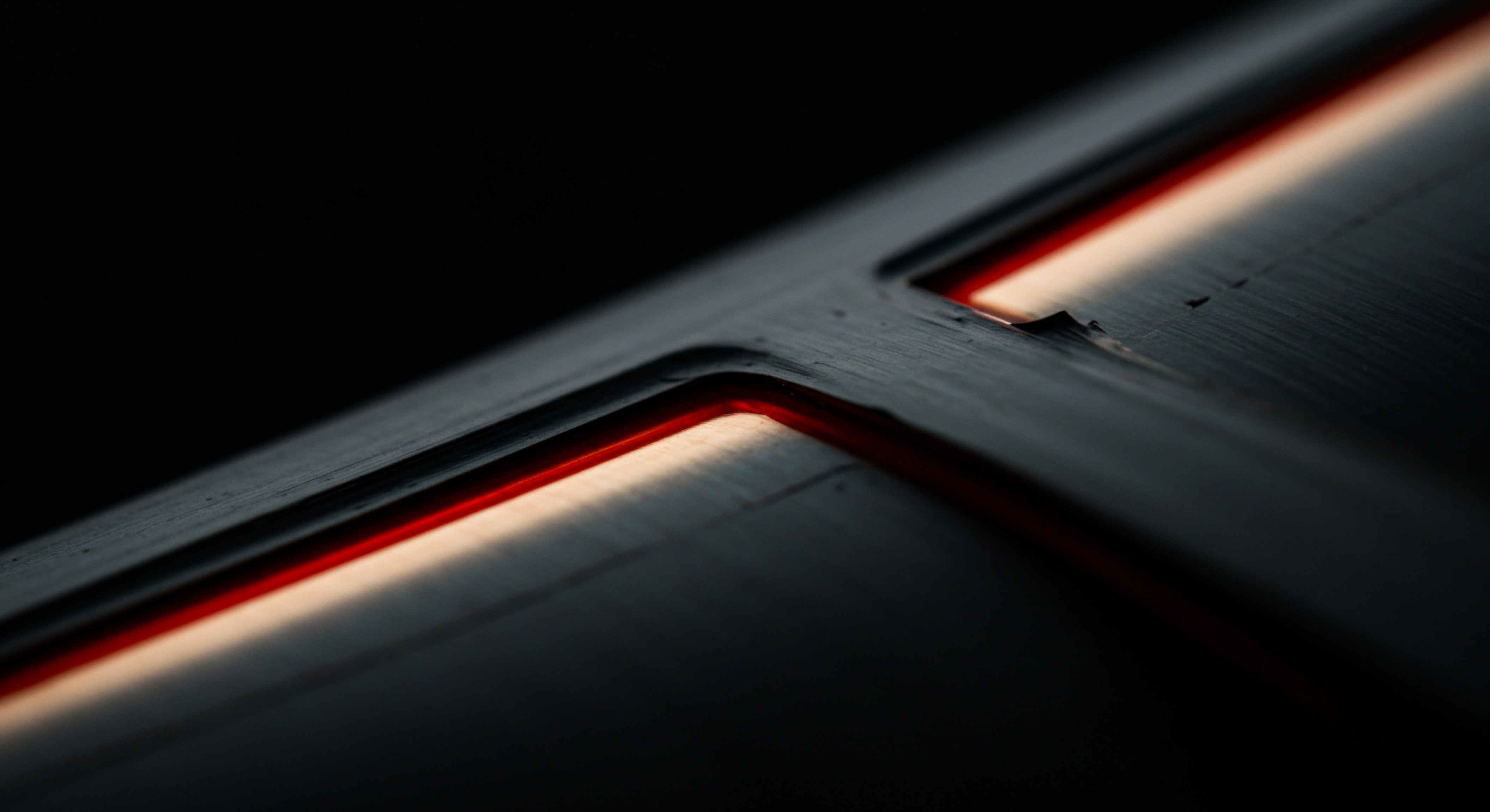 Geometric Dark Surface Featuring Light Lines Innovation for a Start up SMB This close-up view portrays part of a geometric plane with glowing lines perfect for marketing materials in a business environment. The dark texture plays with light showcasing potential innovation within any corporation or team for scaling, expanding, and optimization. Perfect for content about business tools and solutions for SMB owners focusing on revenue increase through innovative ideas.