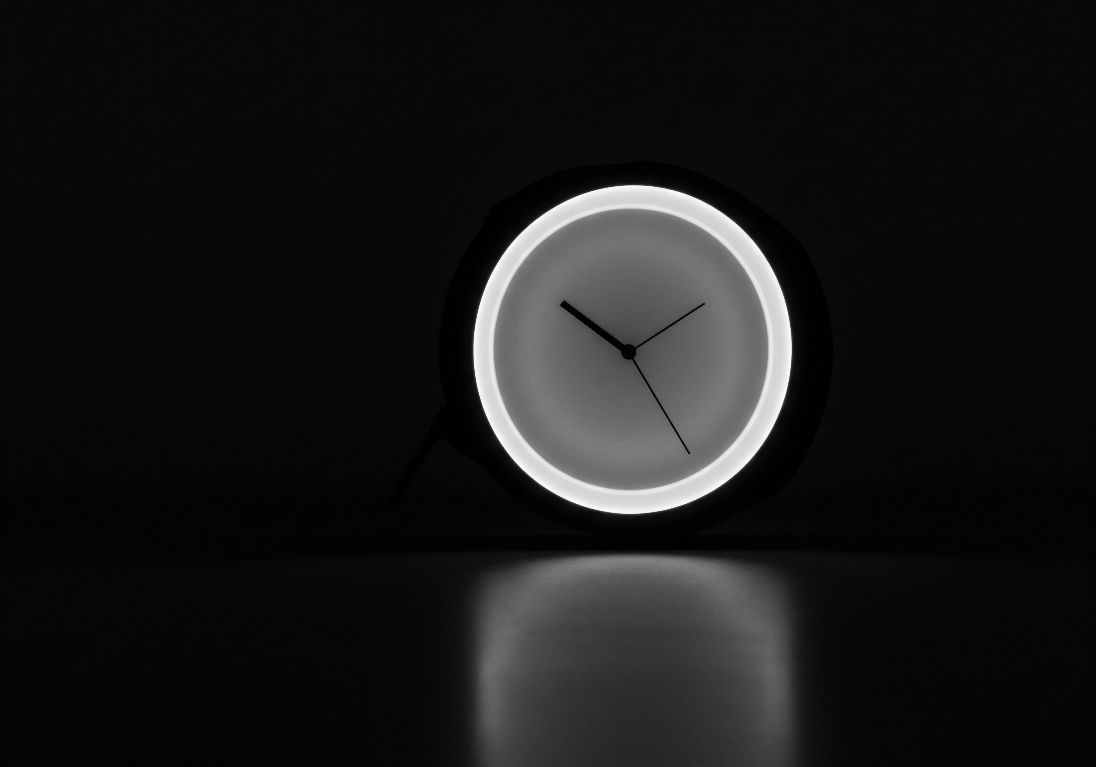 Illuminated Modern Clock Reflecting Innovation in Business Automation Strategies for SMB A brightly illuminated clock standing out in stark contrast, highlighting business vision for entrepreneurs using automation in daily workflow optimization for an efficient digital transformation. Its sleek design mirrors the progressive approach SMB businesses take in business planning to compete effectively through increased operational efficiency, while also emphasizing cost reduction in professional services. Like a modern sundial, the clock measures milestones achieved via innovation strategy driven Business Development plans, showcasing the path towards sustainable growth in the modern business.