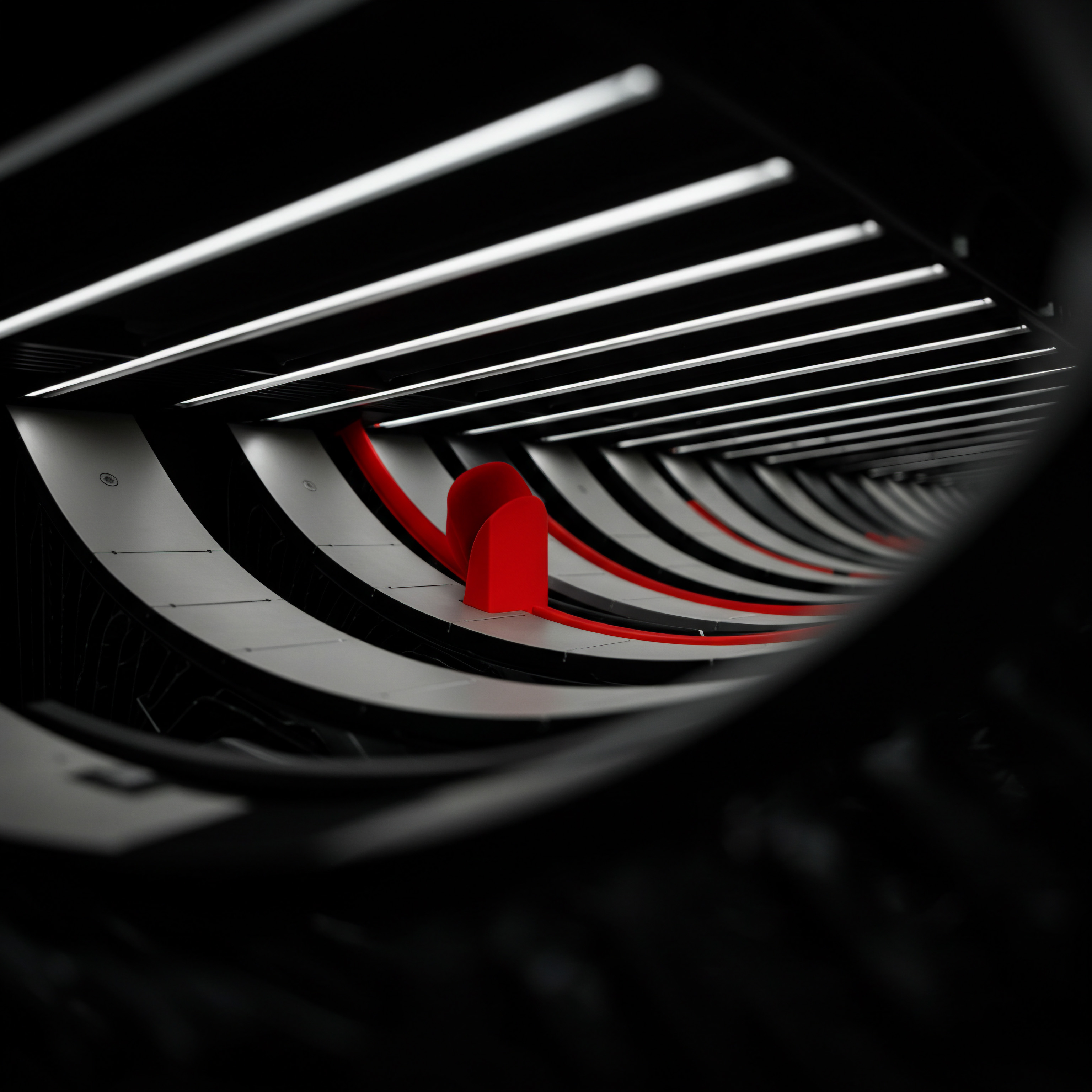 Through a circular framing a striking image reveals the core of SMB growth propelled by automation and innovative solutions. A prominent red structure takes center stage contrasted against black and white surroundings representative of a modern streamlined system poised for business automation. The repeating patterns embody optimization illustrating workflow efficiency designed for small business scaling to medium business magnitude. Multiple parallel horizontal lines suggest the technology infrastructure essential for supporting digital transformation and online presence improvement with strategic digital tools. It communicates the opportunity potential for businesses seeking scale strategy focused planning success using growth hacking and business development practices creating a resilient adaptability to future of work innovation. The image serves as a symbol of positive growth using cloud solutions to enhance market share.