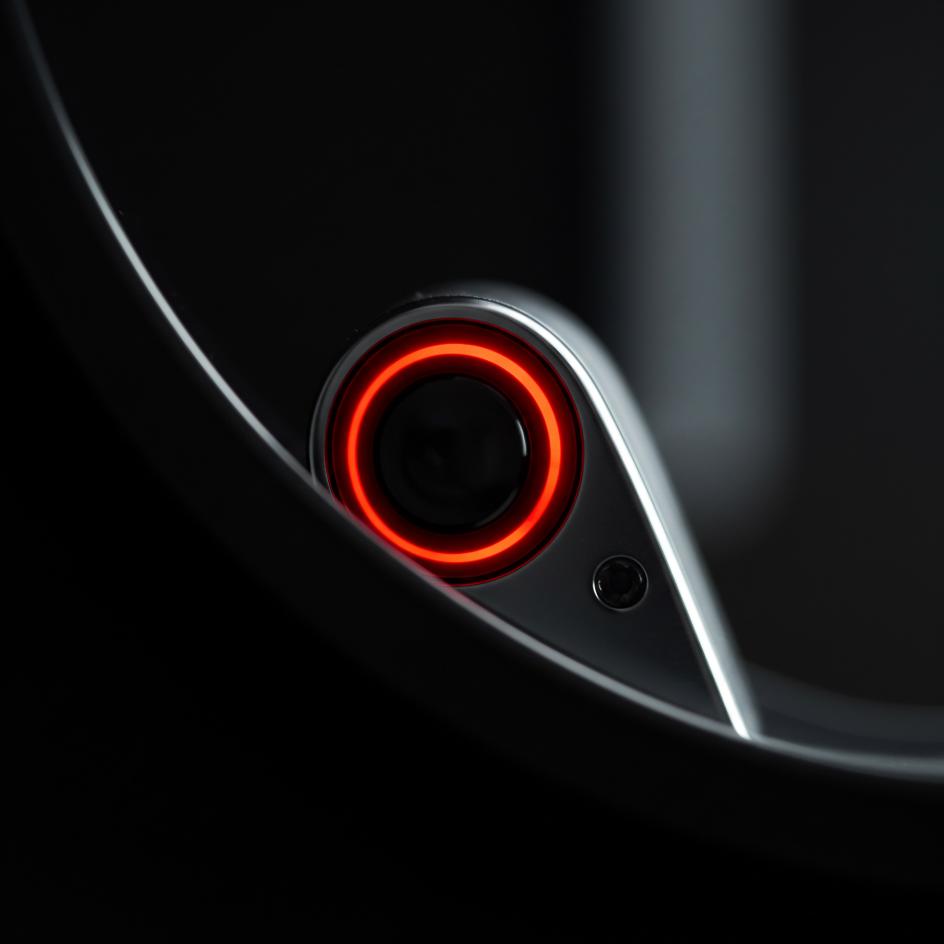 Red Circular Device Light Innovation Technology for Business Scaling Entrepreneurs Startup Close-up detail of an innovative device indicates technology used in the workspace of a small business team. The striking red ring signals performance, efficiency, and streamlined processes for entrepreneurs and scaling startups looking to improve productivity through automation tools. Emphasizing technological advancement, digital transformation and modern workflows for success.