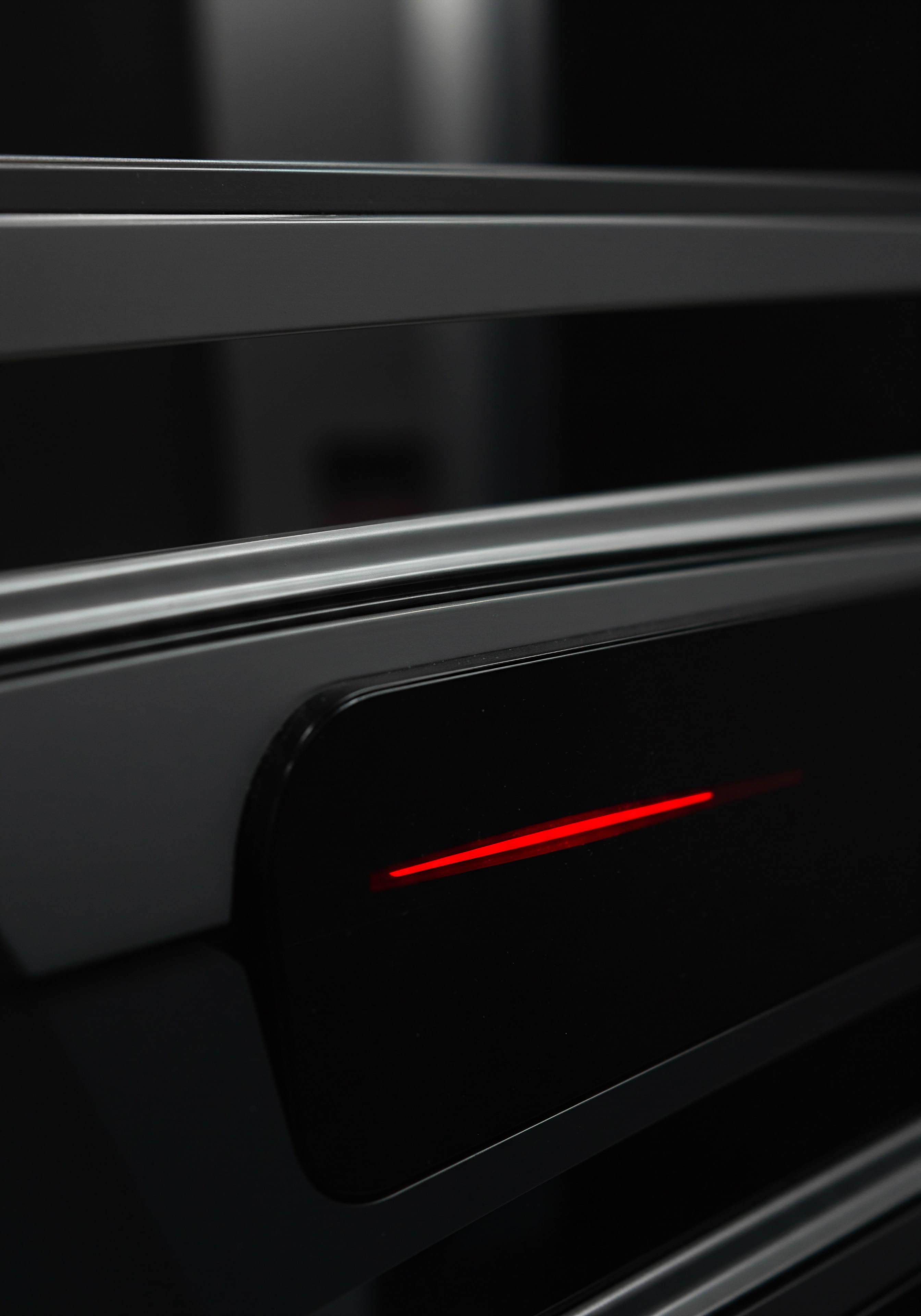 Red Indicator Light on Modern Equipment Panel Illustrating Technology for SMB Business A striking red indicator light illuminates a sophisticated piece of business technology equipment, symbolizing Efficiency, Innovation and streamlined processes for Small Business. The image showcases modern advancements such as Automation systems enhancing workplace functions, particularly vital for growth minded Entrepreneur’s, offering support for Marketing Sales operations and human resources within a fast paced environment. The technology driven composition underlines the opportunities for cost reduction and enhanced productivity within Small and Medium Businesses through digital tools such as SaaS applications while reinforcing key goals which relate to building brand value, brand awareness and brand management through innovative techniques that inspire continuous Development, Improvement and achievement in workplace settings where strong teamwork ensures shared success.