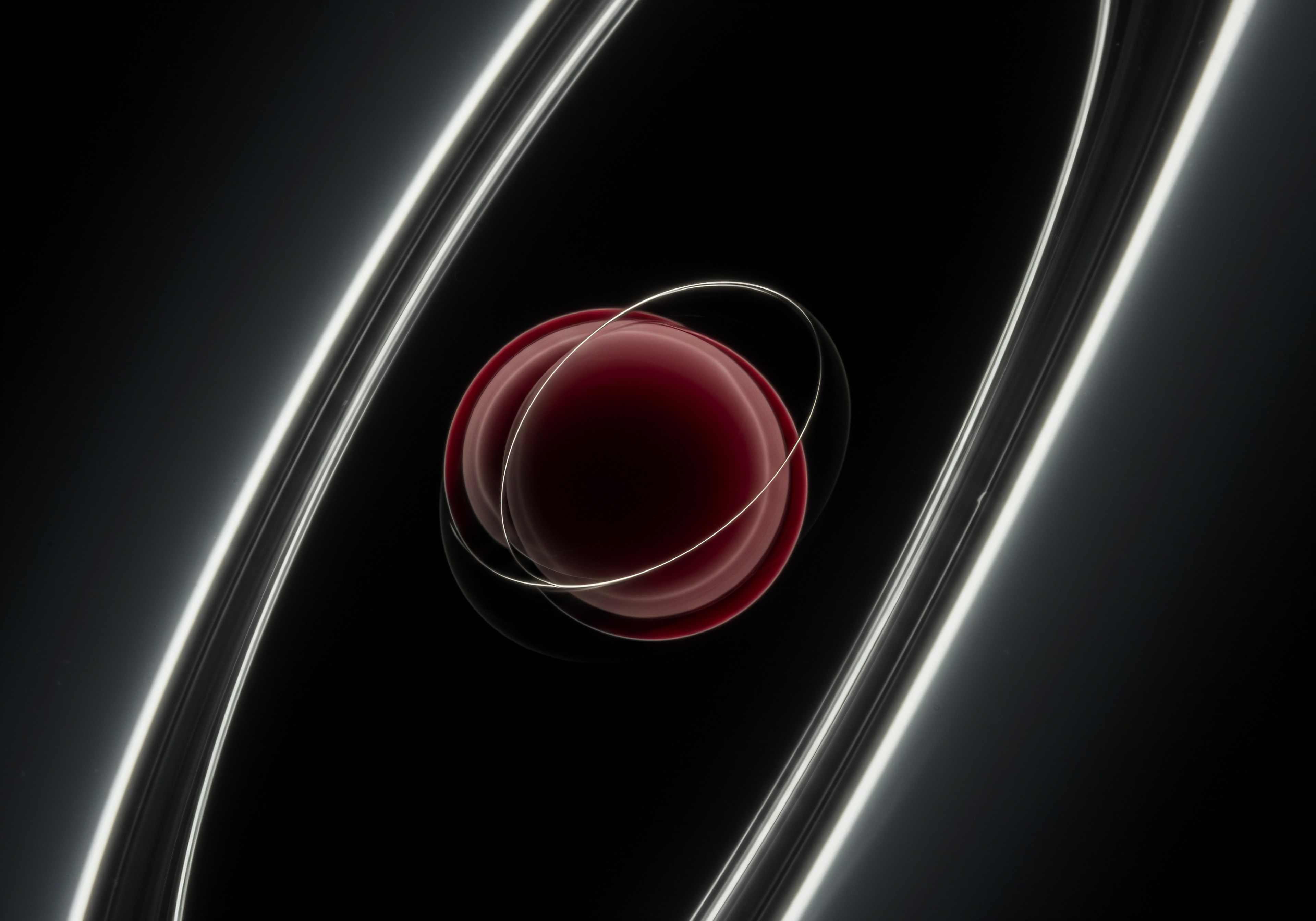 A vivid red sphere takes center stage, suggesting a central hub for innovation or a core product for a small business. Concentric bright rings gracefully encircle it. They embody streamlining process through business automation, driving efficiency within a company. The stark contrast against the black backdrop reinforces ideas like optimization in a competitive market. This design captures small business and the scaling journey, emphasizing a forward focus. Ideas such as technological services supporting entrepreneurs or technology implementation in management, business transformation or data-driven expansion come to the fore, highlighting opportunities for progress for companies engaged in ecommerce and looking for sales growth through digital marketing. The overall aesthetic communicates an optimistic path and entrepreneurial journey.