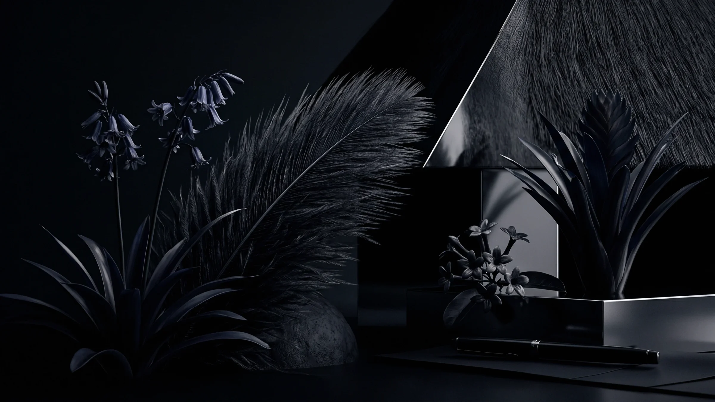 Bluebells, spiky plants and a soft gray plume arranged on a dark desk with a pen and steel blocks.